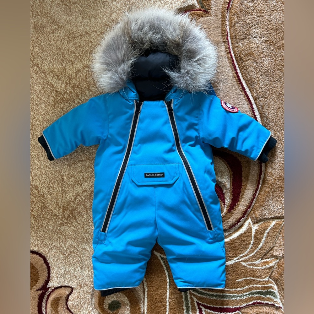 BRAND NEW CANADA GOOSE LAMB SNOWSUIT- BLUE TOPAZ (SIZE 0-3) WITH TAGS + FUR.